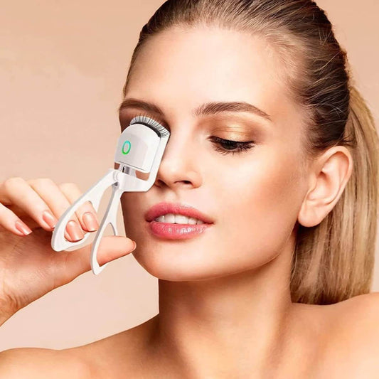 Achieve long-lasting curls with the Heated Eyelash Curler for flawless lashes. Beautycom.  