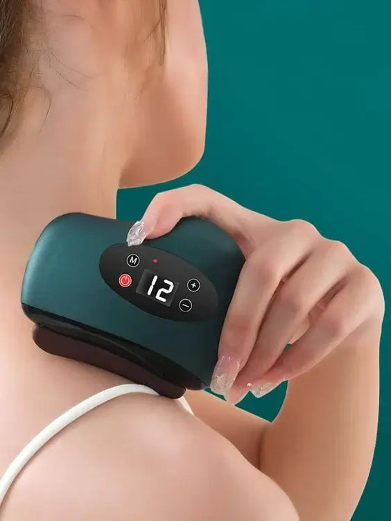 Portable electric Gua Sha tool for sculpting and rejuvenating your face. Beautycom.  