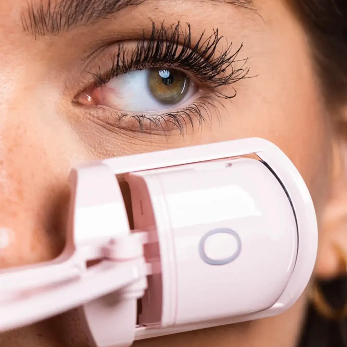 Effortlessly curl your lashes with the Heated Eyelash Curler for all-day volume. Beautycom.  